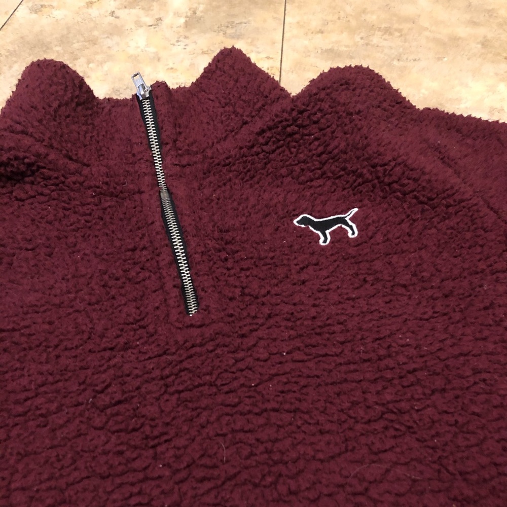 GUC vs pink Sherpa pullover